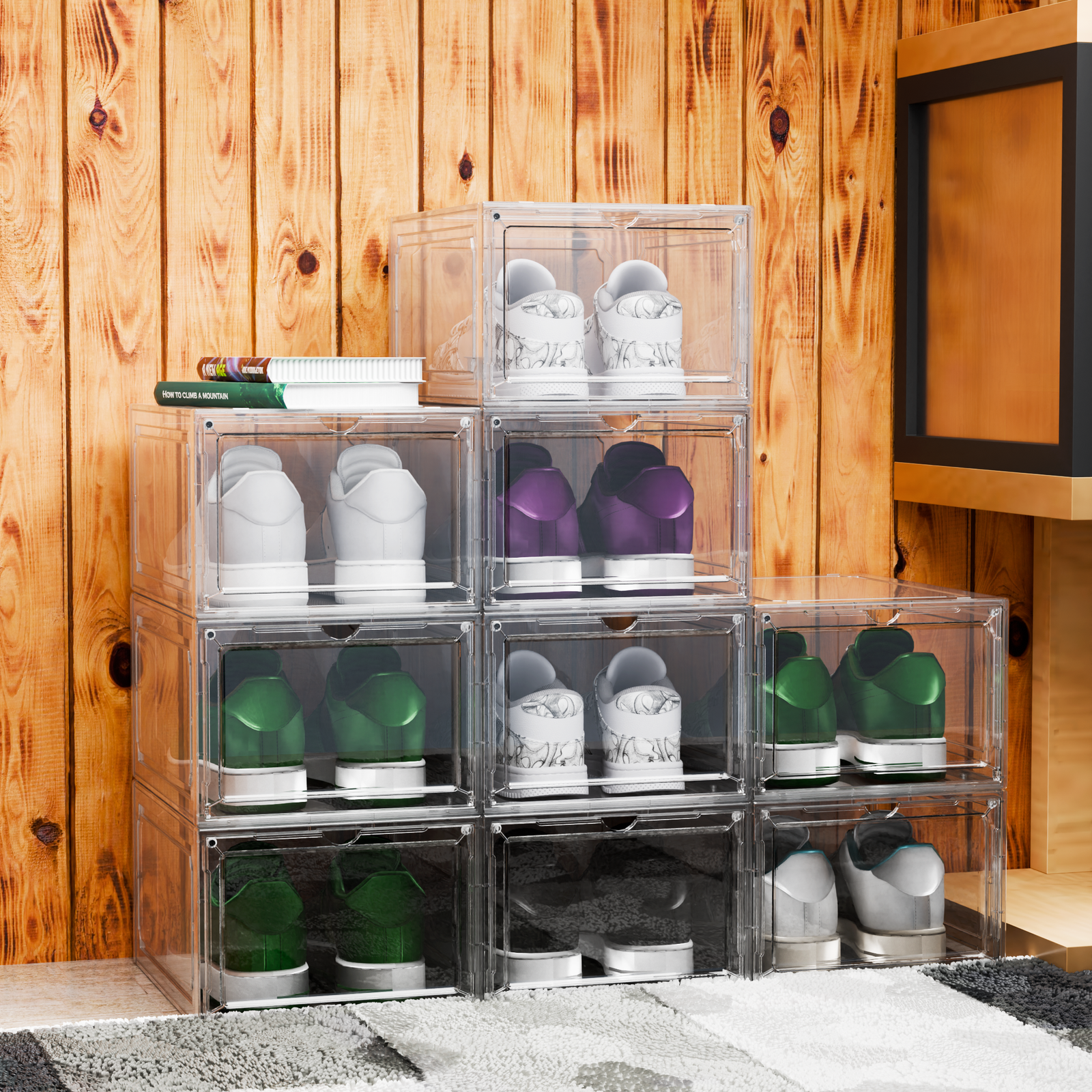 Stack of transparent shoe boxes displaying sneakers